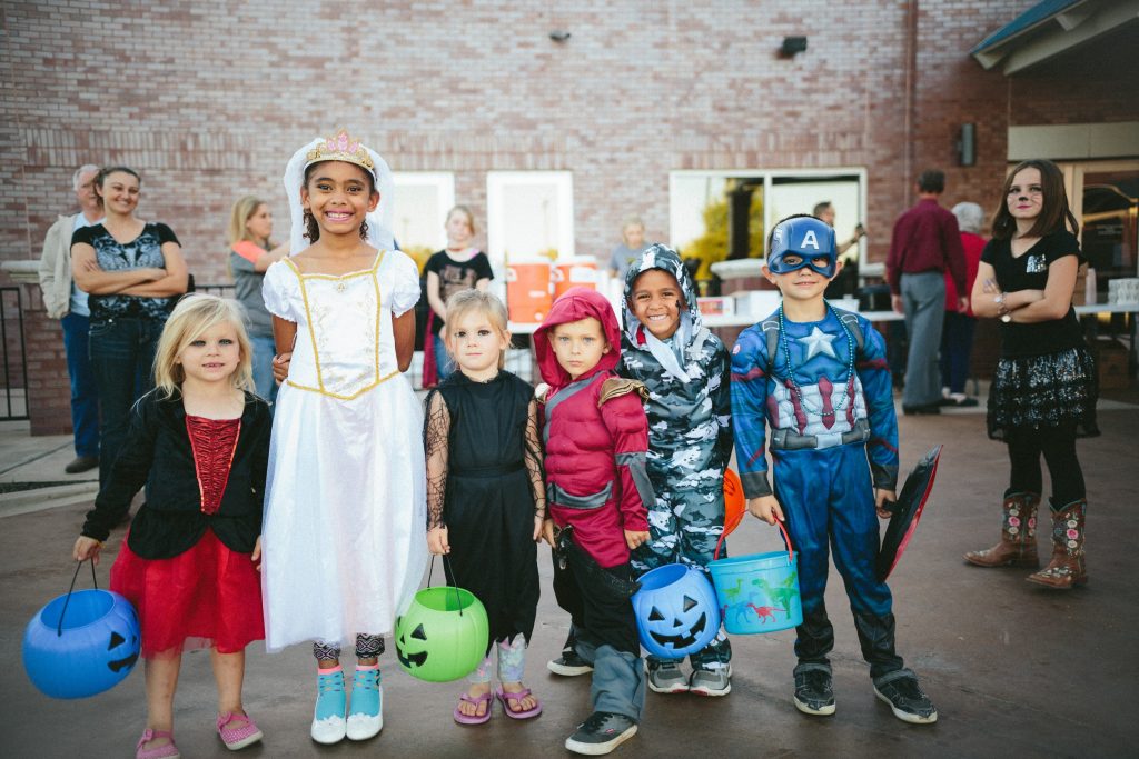 A group of children dressed up for Halloween