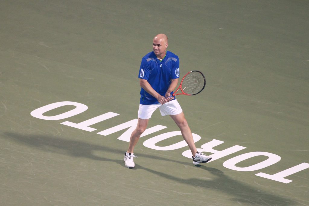 A photograph of Andre Agassi, who exhibits male pattern baldness