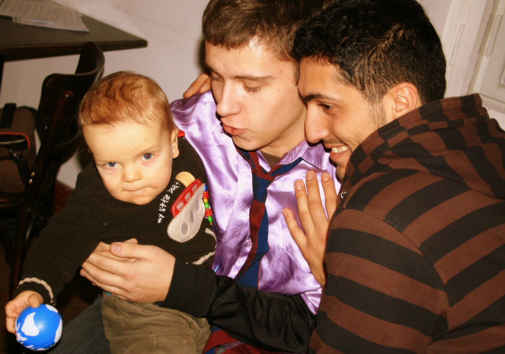 A male couple with a child