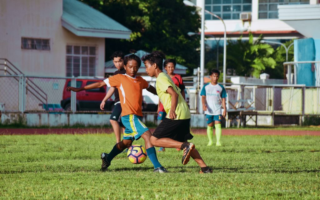 Children playing soccer