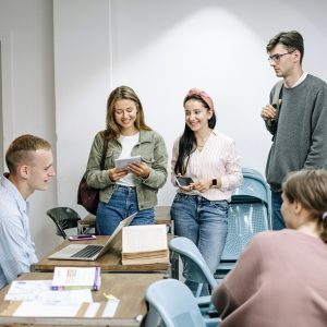 People are studying together, however, one of the folks feels excluded from the discussion.