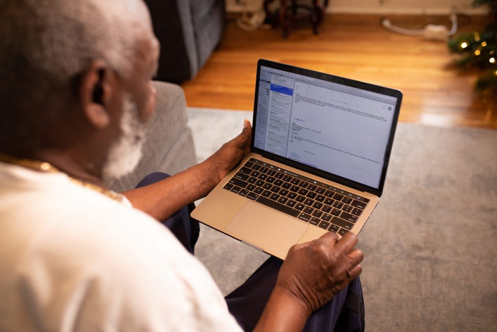 Older man using a laptop