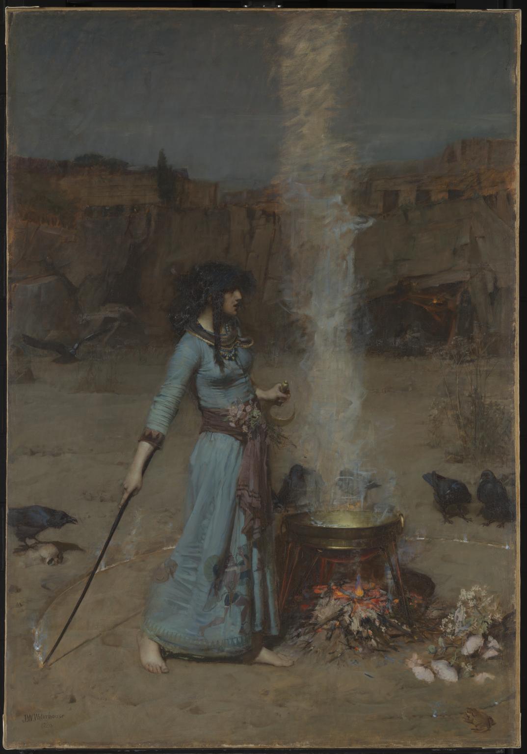 A woman beside a pot over a fire holding a stick to draw a large circle on the ground