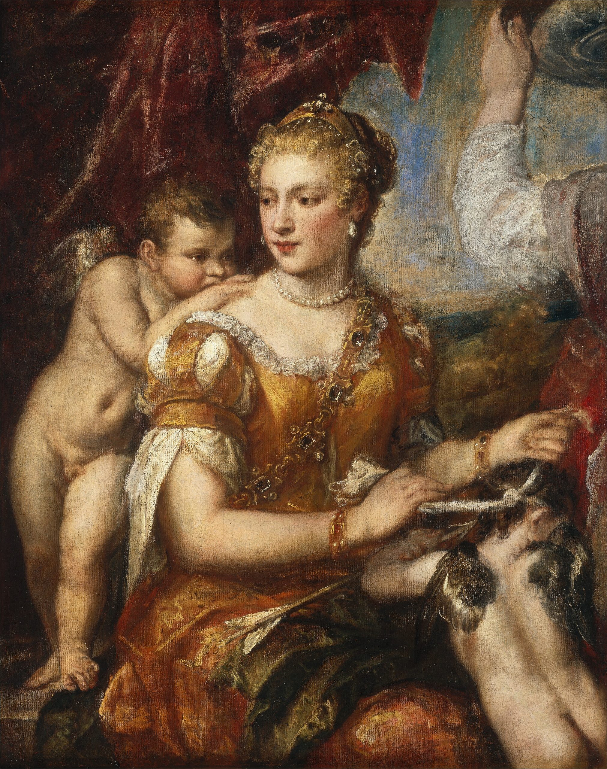 A painting of Venus surrounded by cherubs. Venus is blindfolding Cupid.