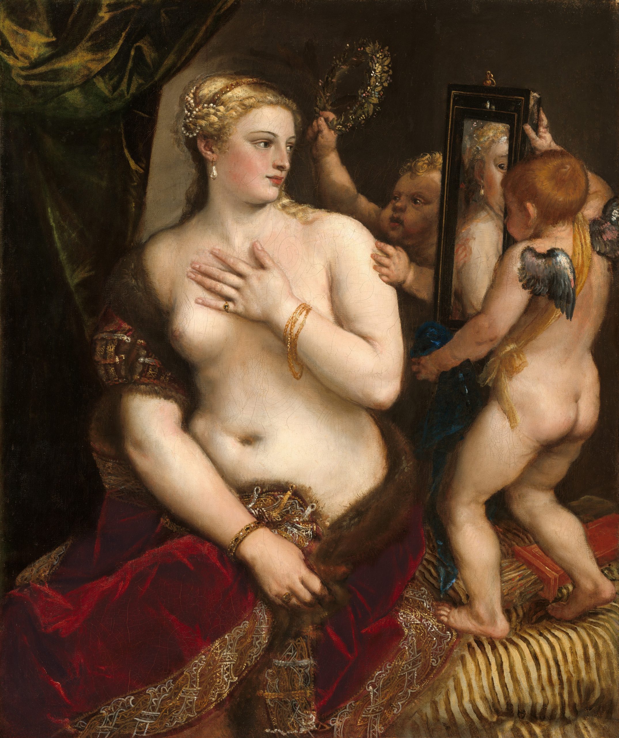A painting of Venus staring into a mirror with cherubs.