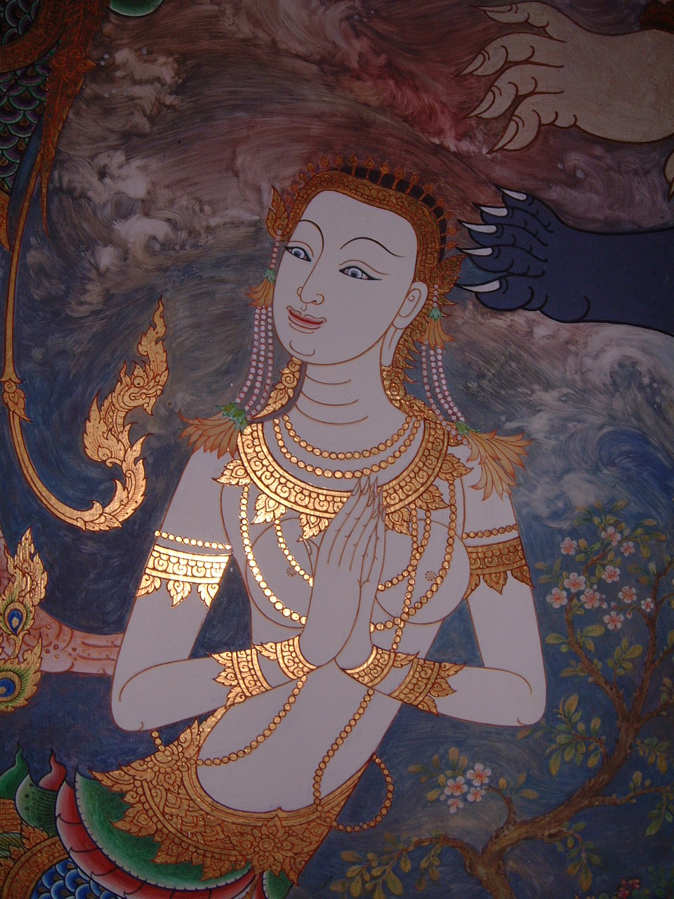 An illustration of a mythical figure with her hands together.