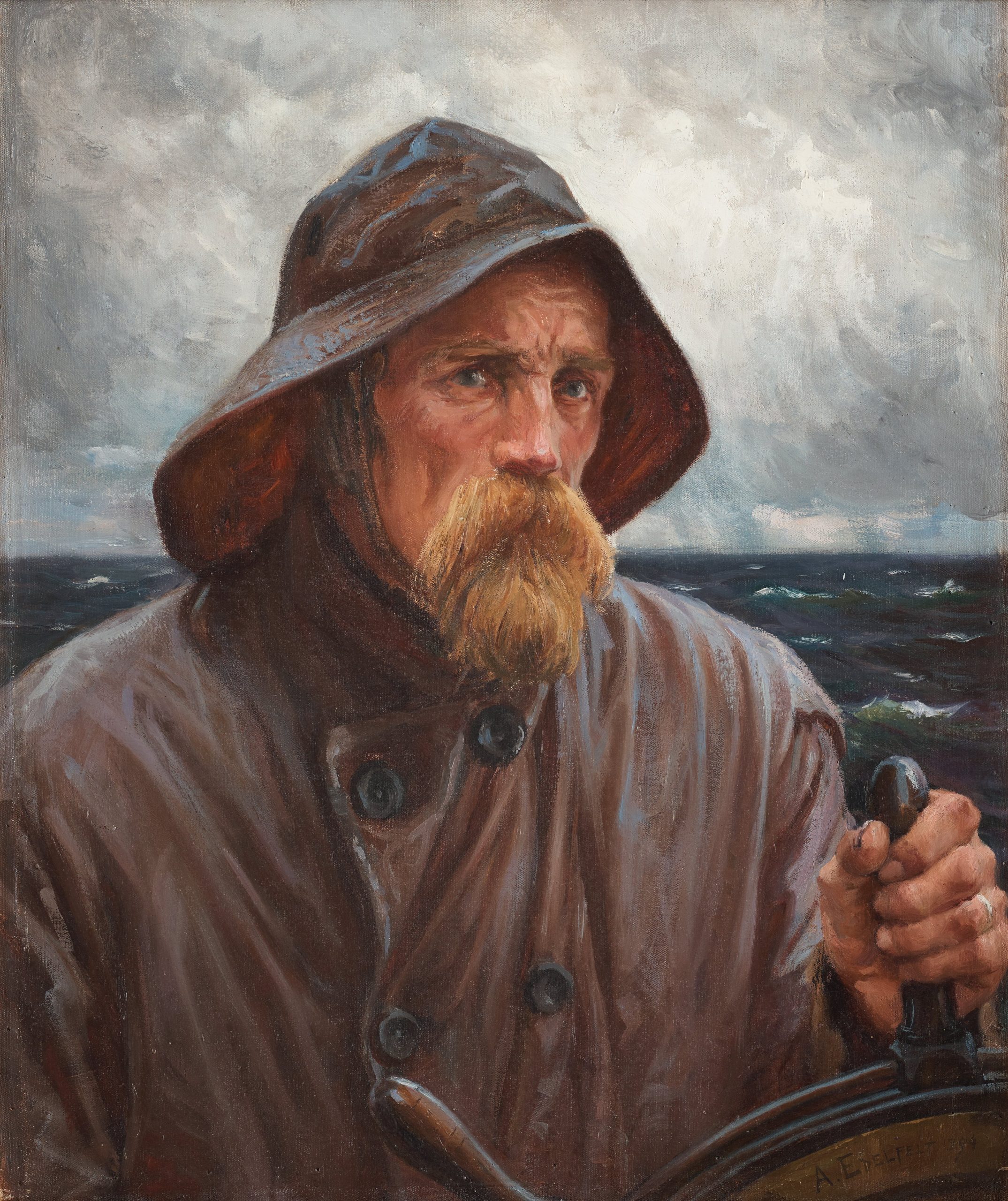 A closeup of a bearded man steering the helm of a ship on a cloudy day