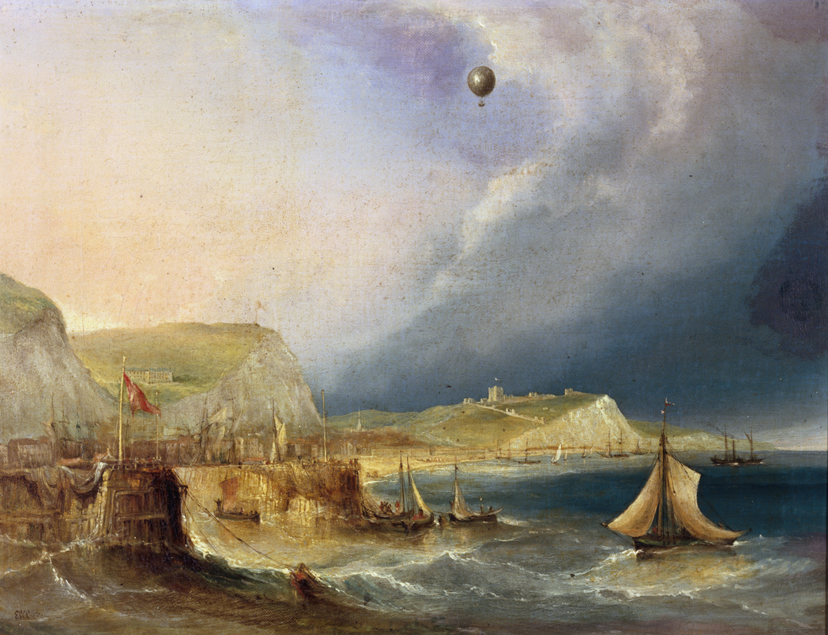 A landscape view of a hot air balloon floating in the sky over the harbour