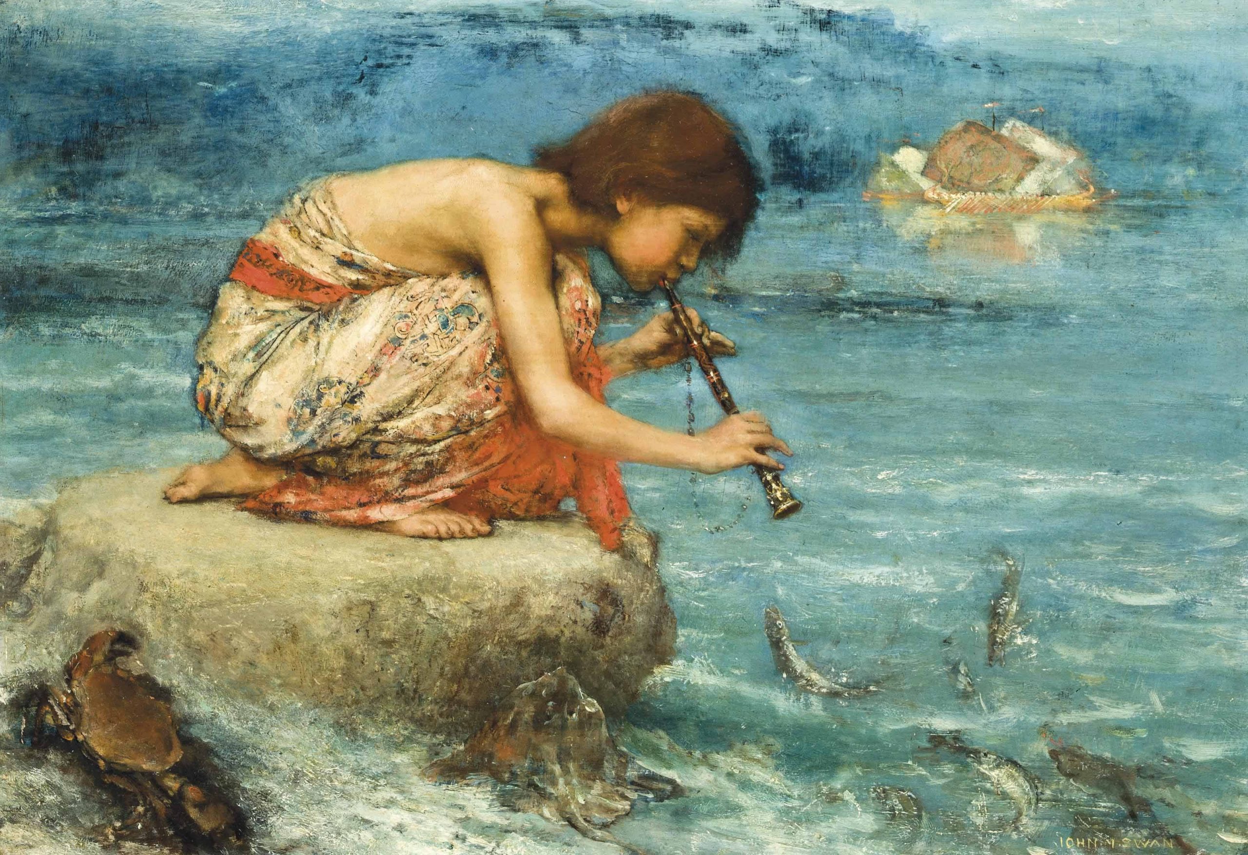 A young girl crouched on a rock playing a pipe to small fish in shallow waters