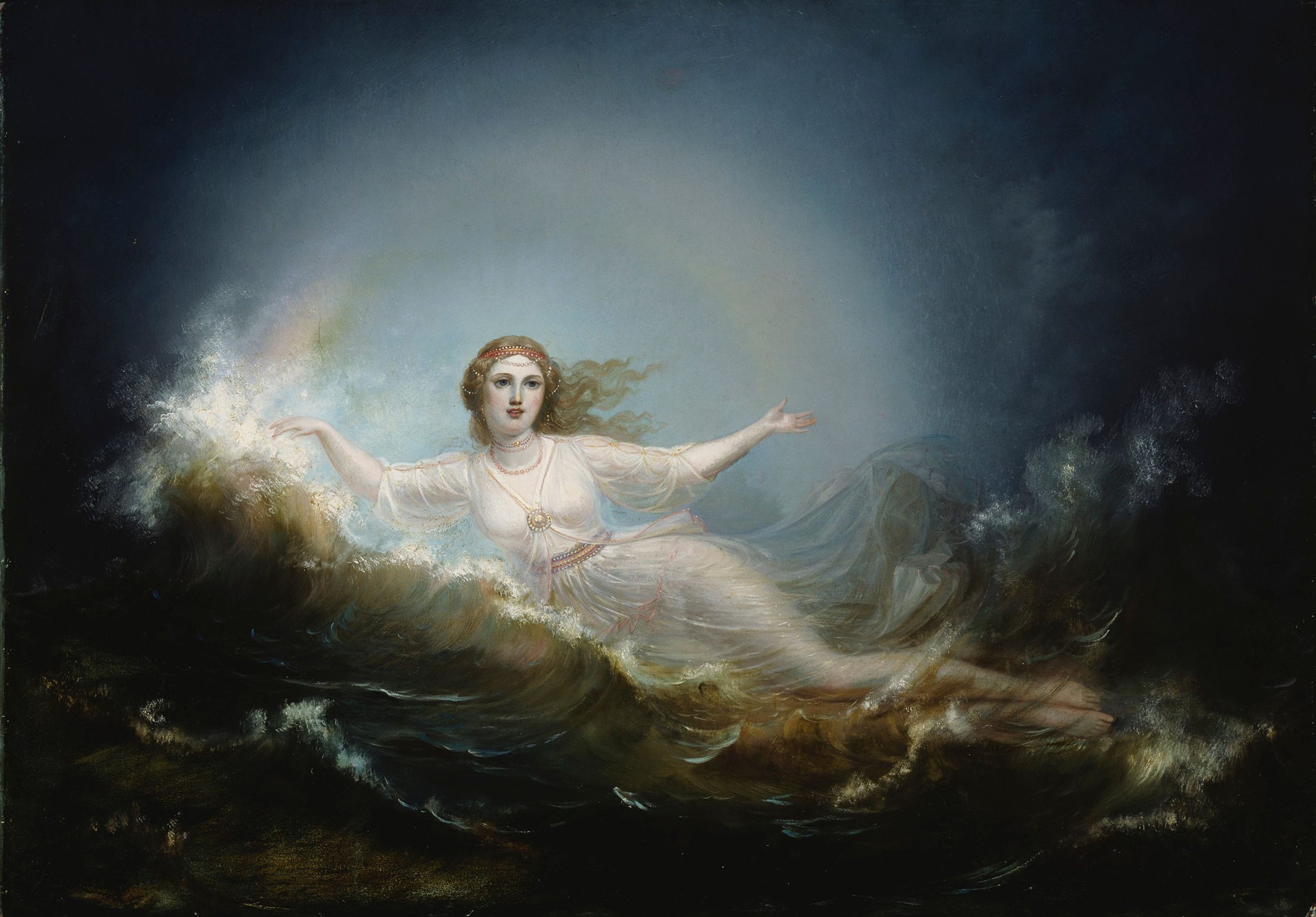 A woman in an inclined position half submerged underwater with arms outstretched to the misty sky