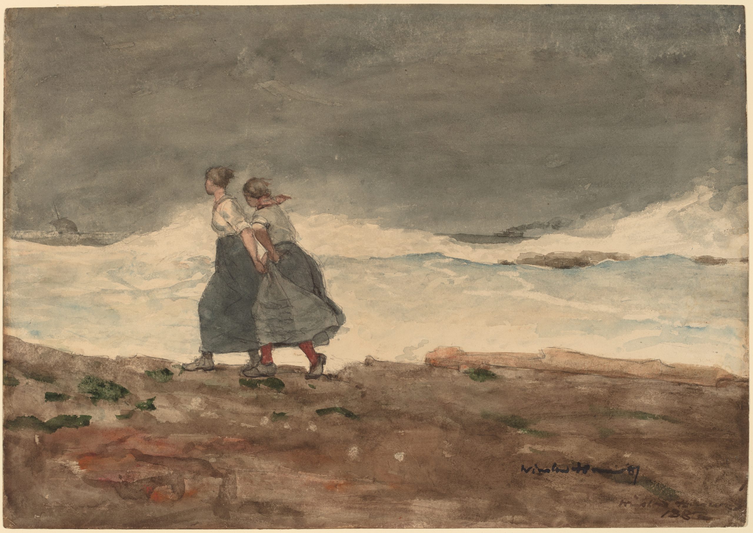 Two women trudging side-by-side through rock-strewn terrain overlooking the ocean