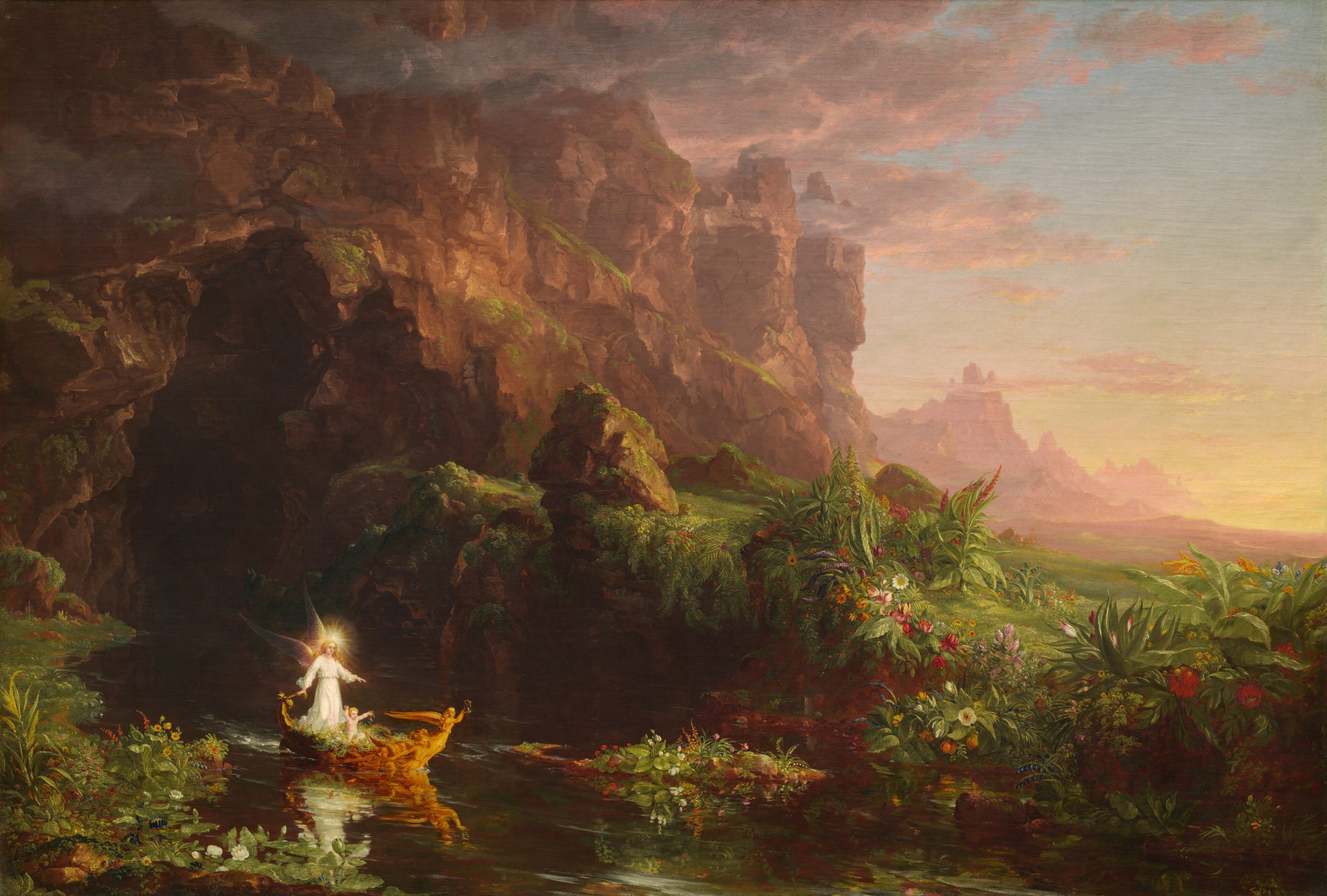 A boat floats through a serene body of water surrounded by mountains and flowers.