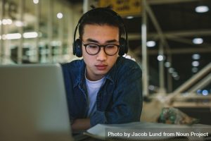 Student Studying from textbook.