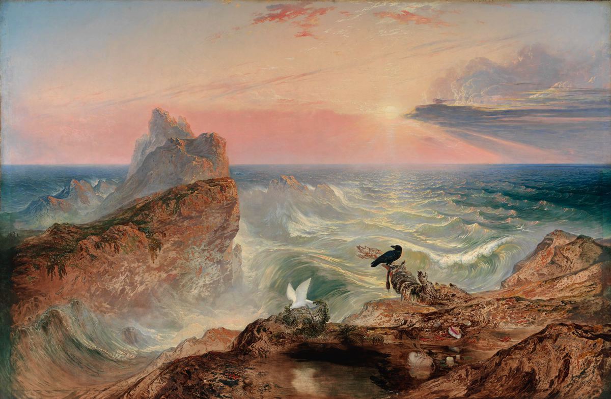 A landscape view of an ocean with cliffs in the foreground