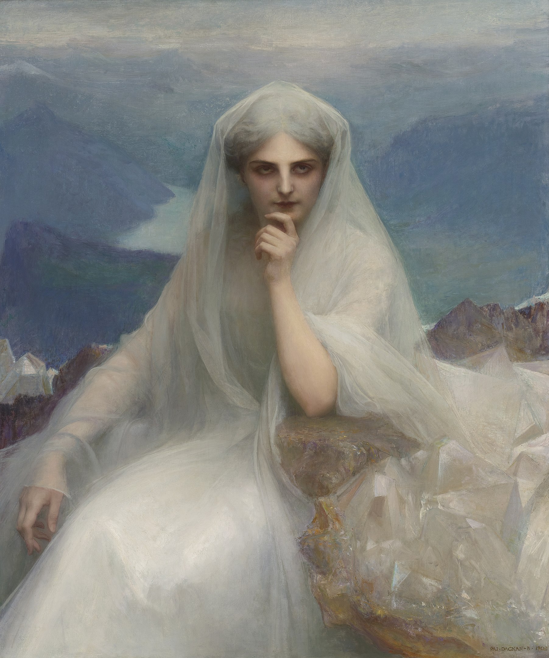 A woman wearing a veil pondering deeply in the mountains