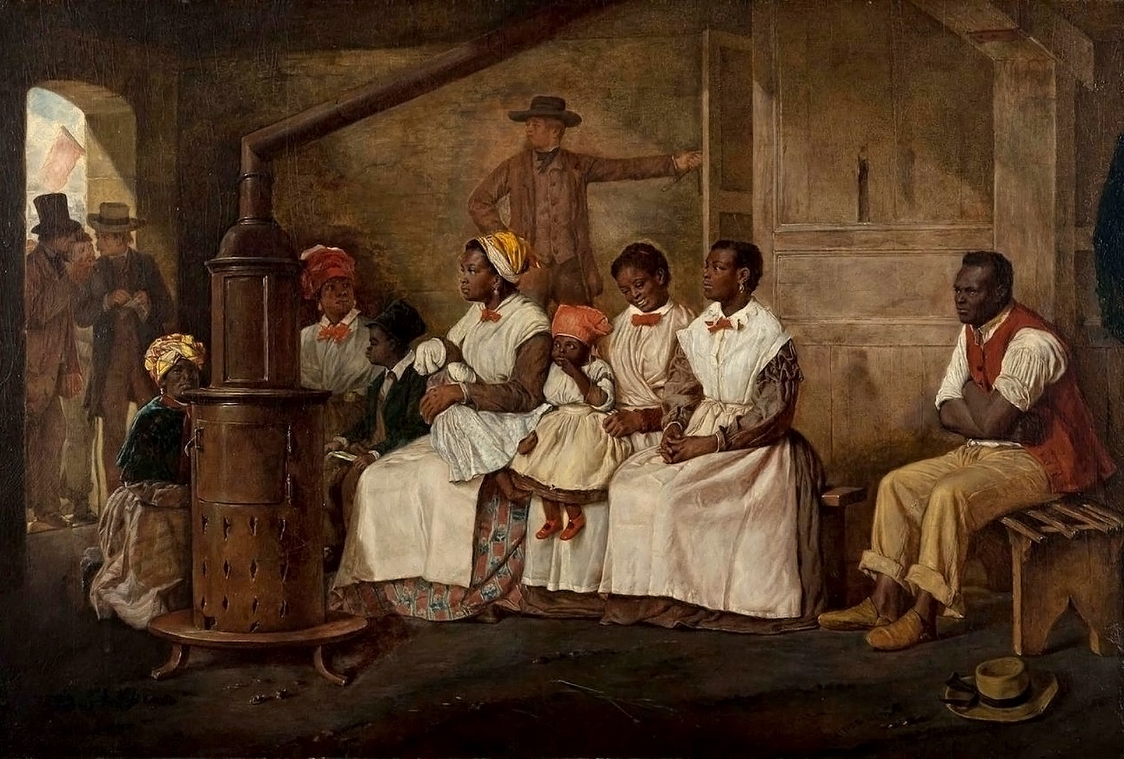 A group of slaves sit around a furnace in a darkened room.