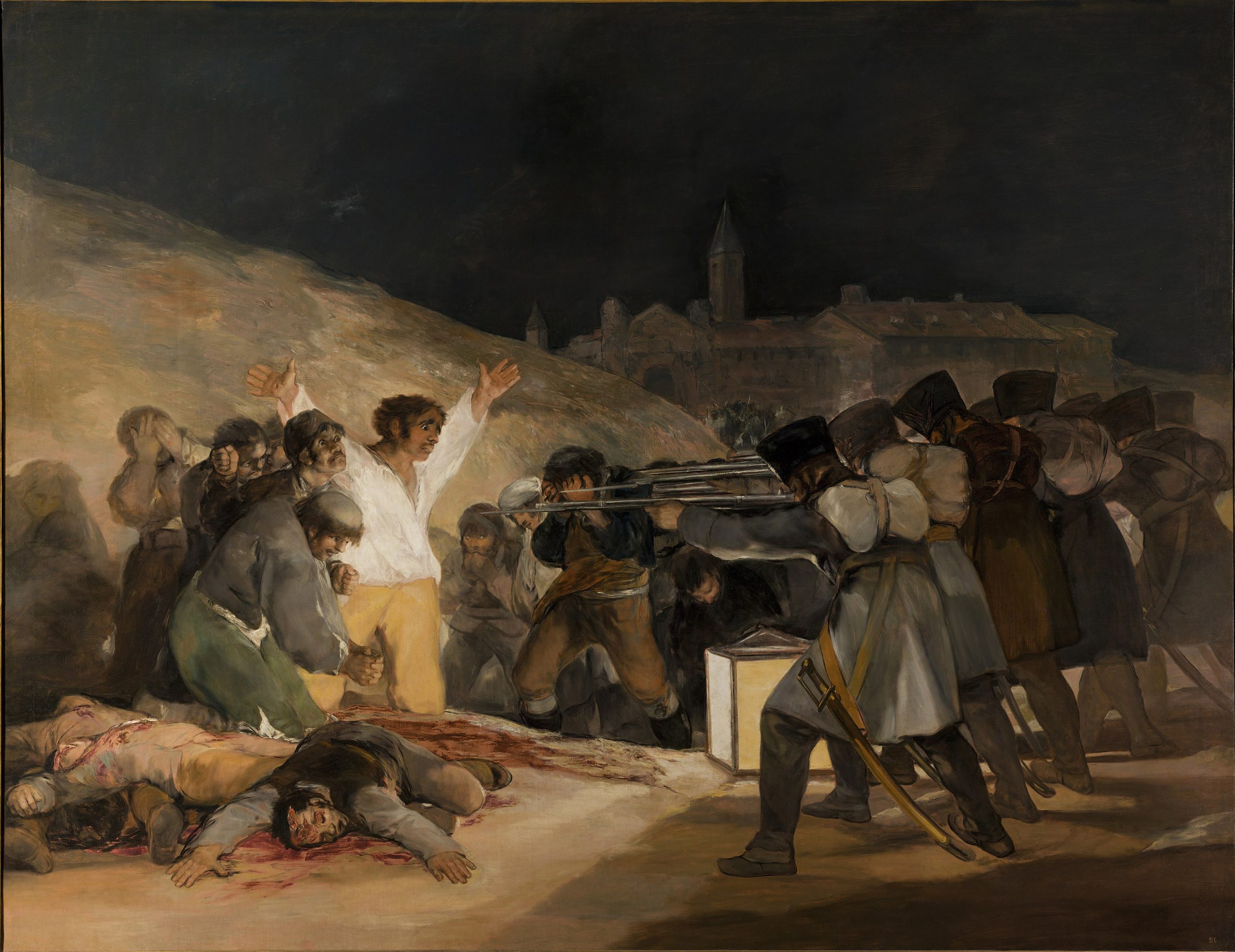 A man with arms outstretched being held at gunpoint by multiple soldiers while civilians cower in fear and lie motionless in the foreground
