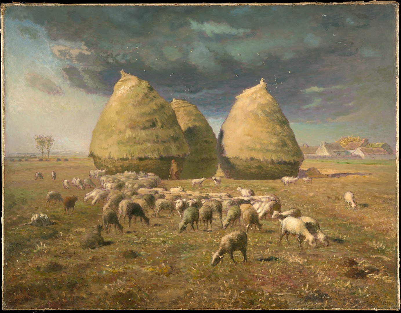 A gloomy sky hovers over stacks of hay and a large group of sheep who are in a moment of leisure.