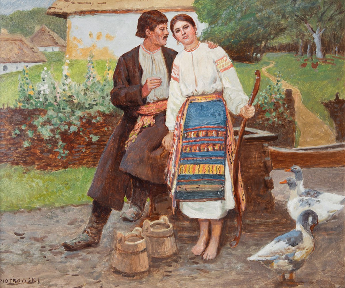 A couple stand next to each other with their arms wrapped around each other surrounded by distant houses and birds.