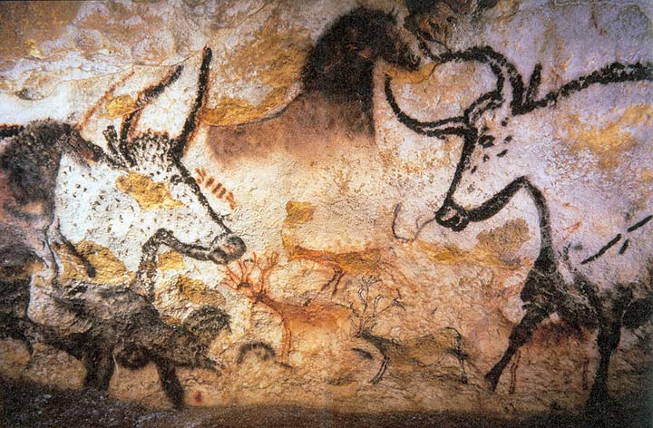 An ancient cave painting depicting aurochs, horses and deer