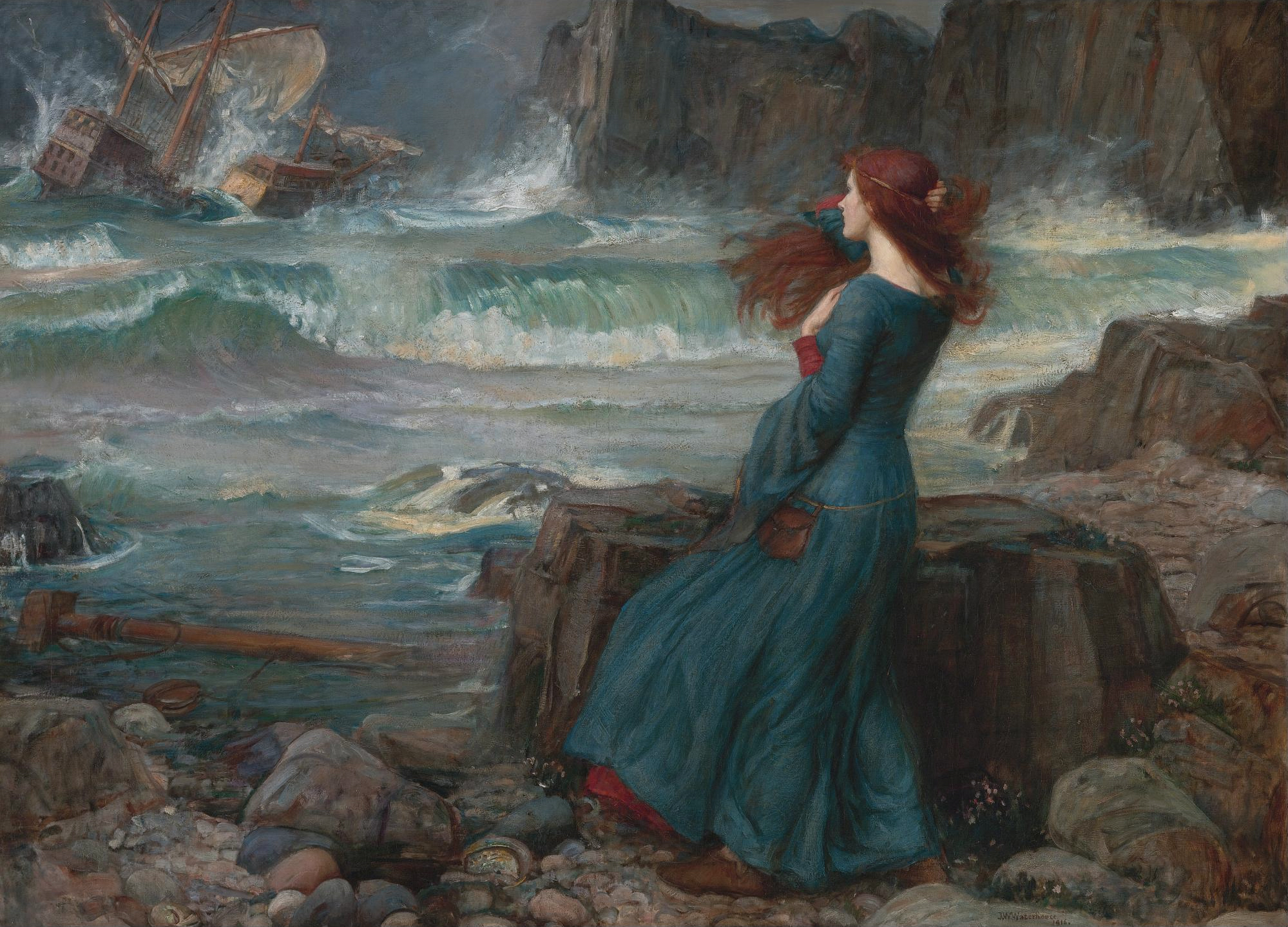 A woman sits on a rock and stares out towards a turbulent body of water.