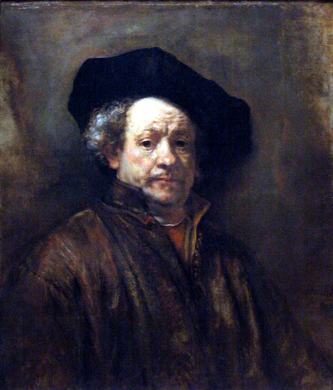 A portrait of a man in a beret