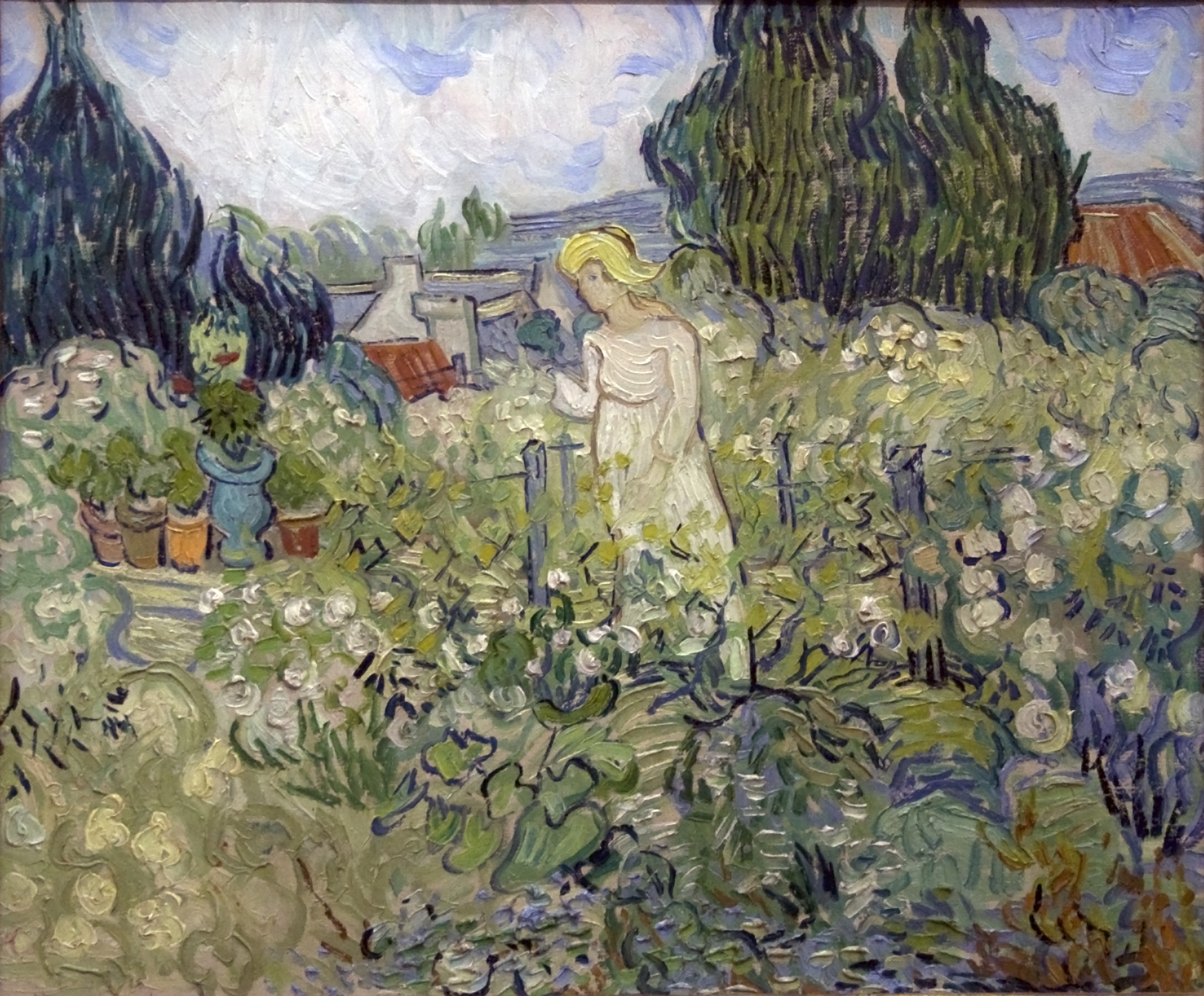 A woman standing in a garden