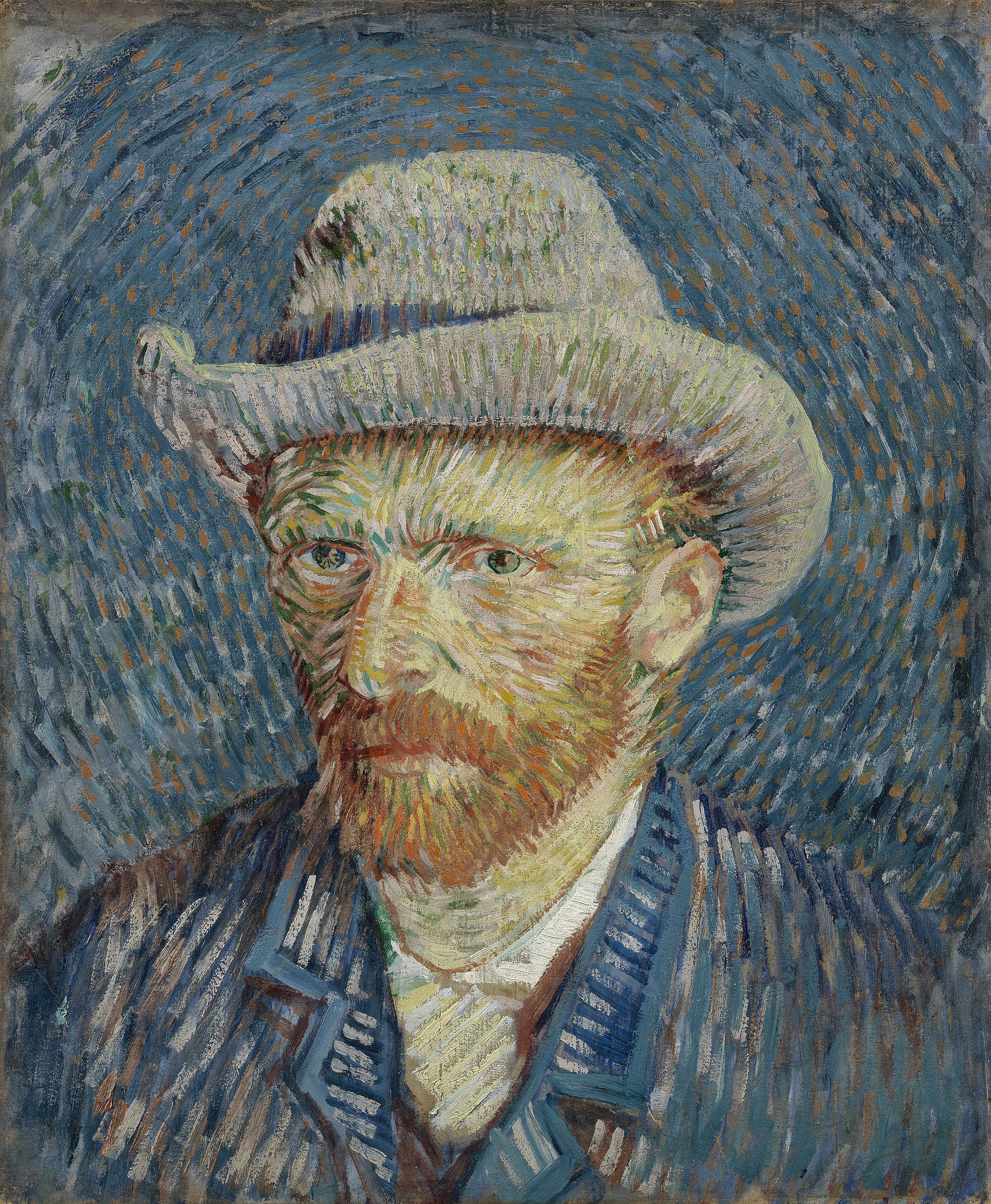 A portrait of a man wearing a hat