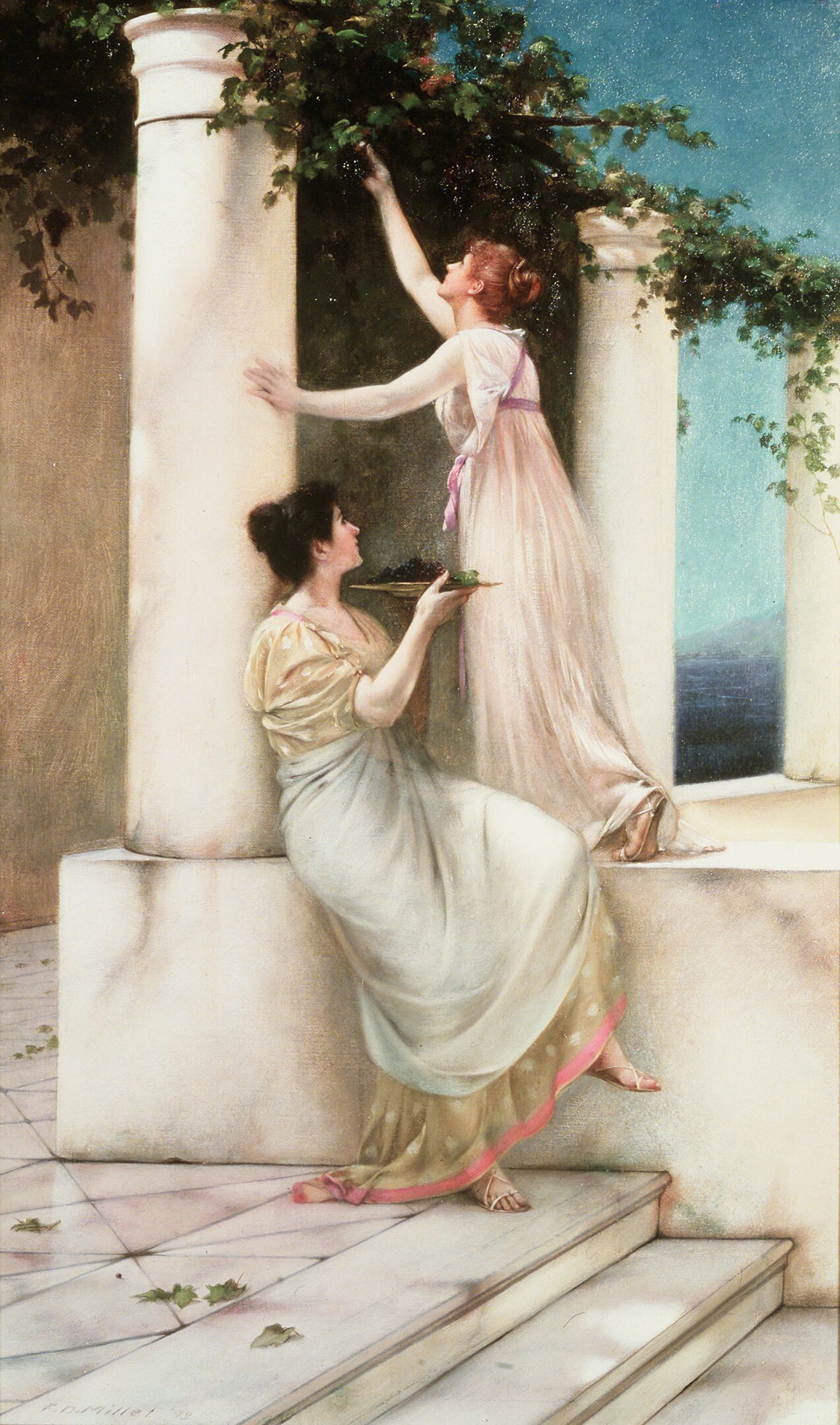 Two women picking fruit from a tree; one stands on a ledge to reach the fruit while the other is seated below holding a plate on which the fruit is placed