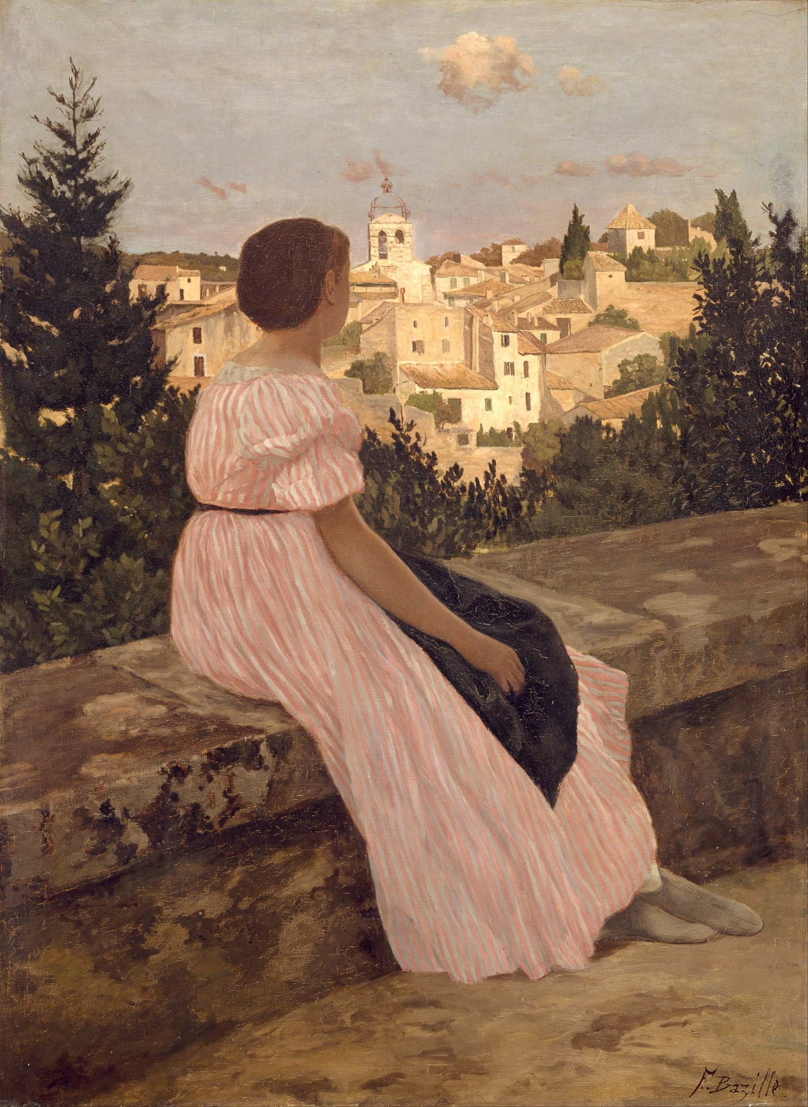 A woman in a pink dress sitting on a ledge observing a town in the distance