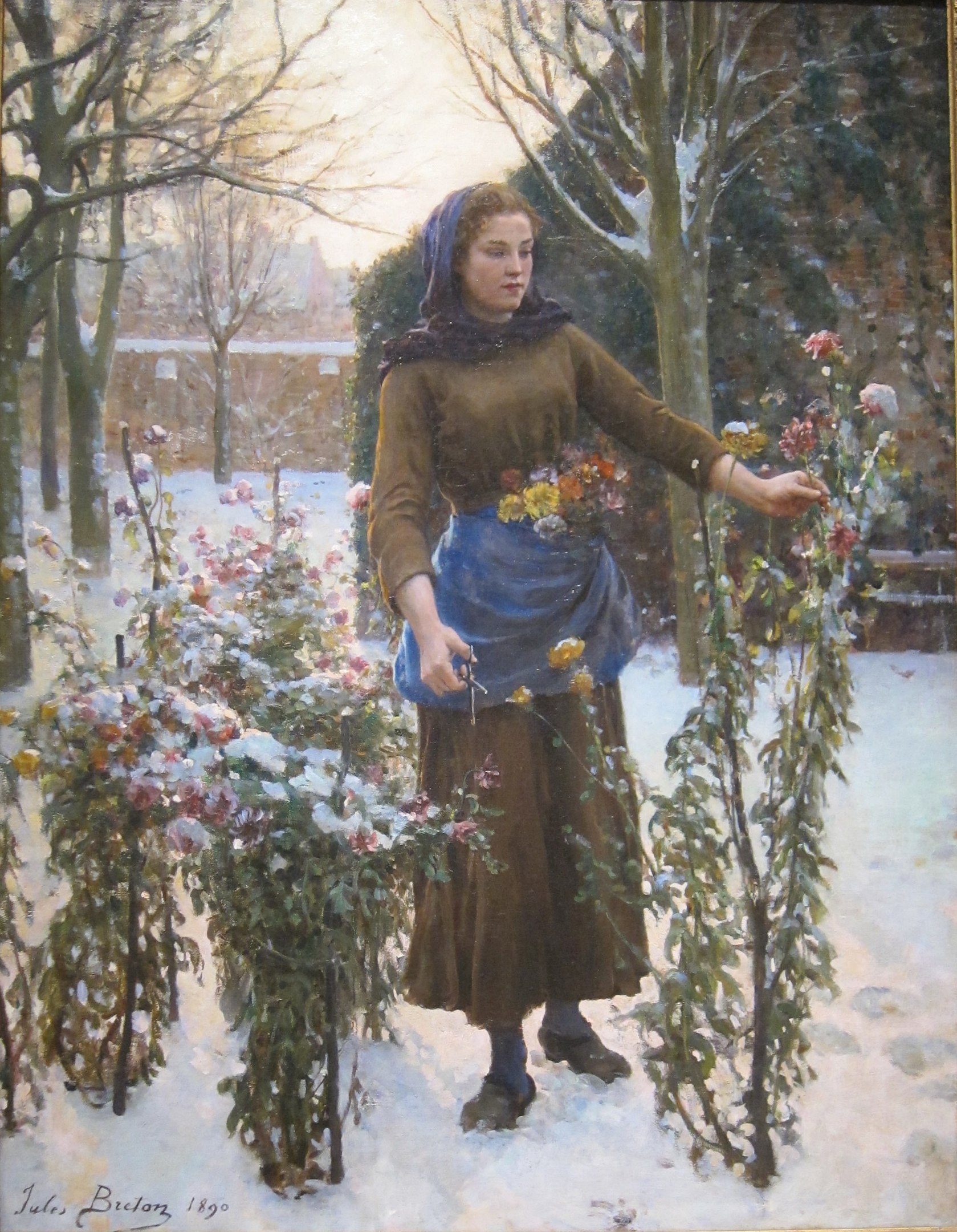 A woman plucking flowers in winter