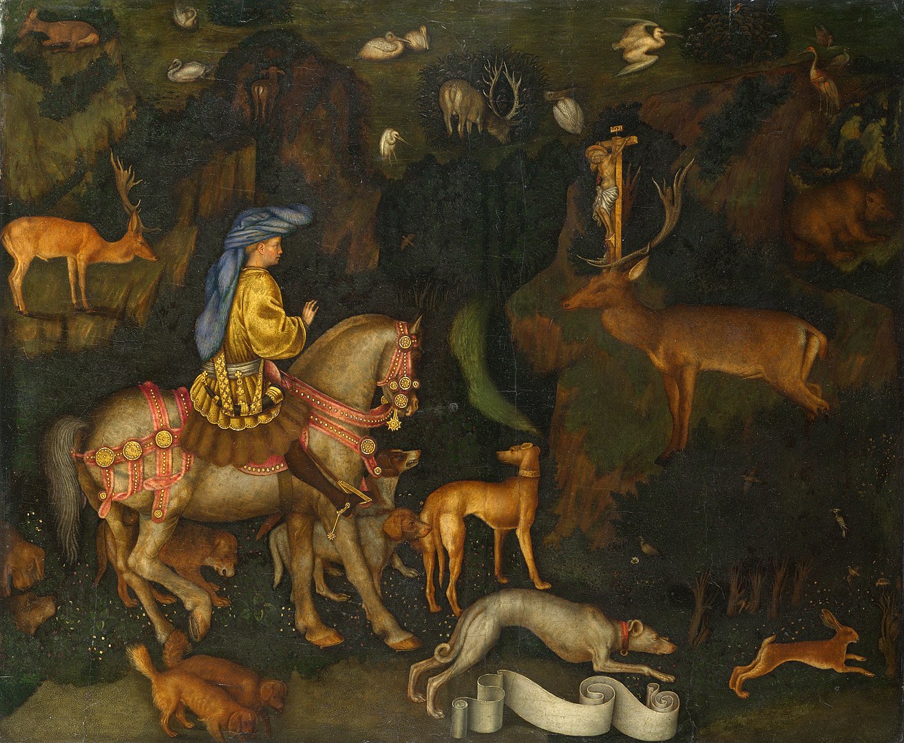 A man riding a horse rides through a forest surrounded by a variety of other four legged creatures.