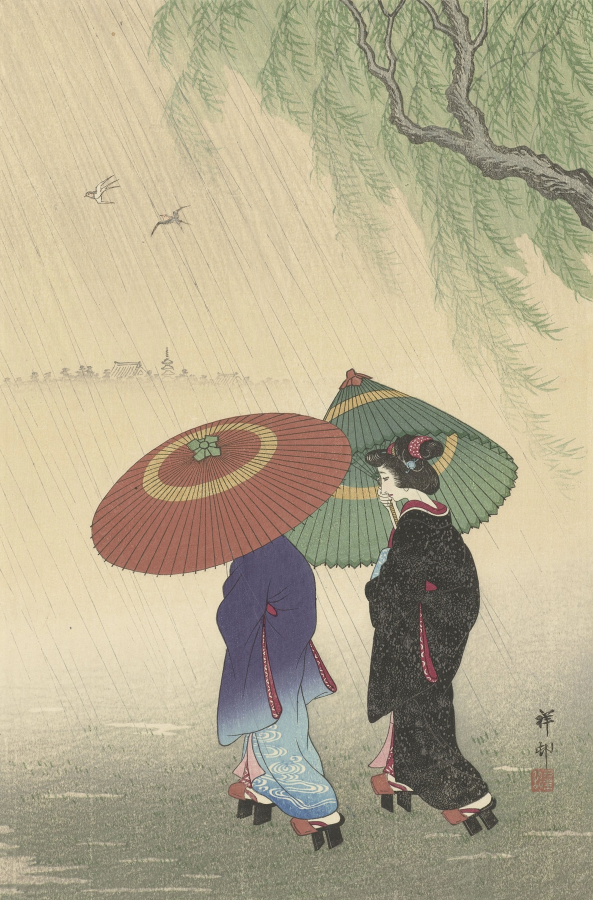 Two women carrying umbrellas walking in the rain