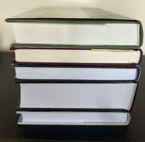 A stack of five books